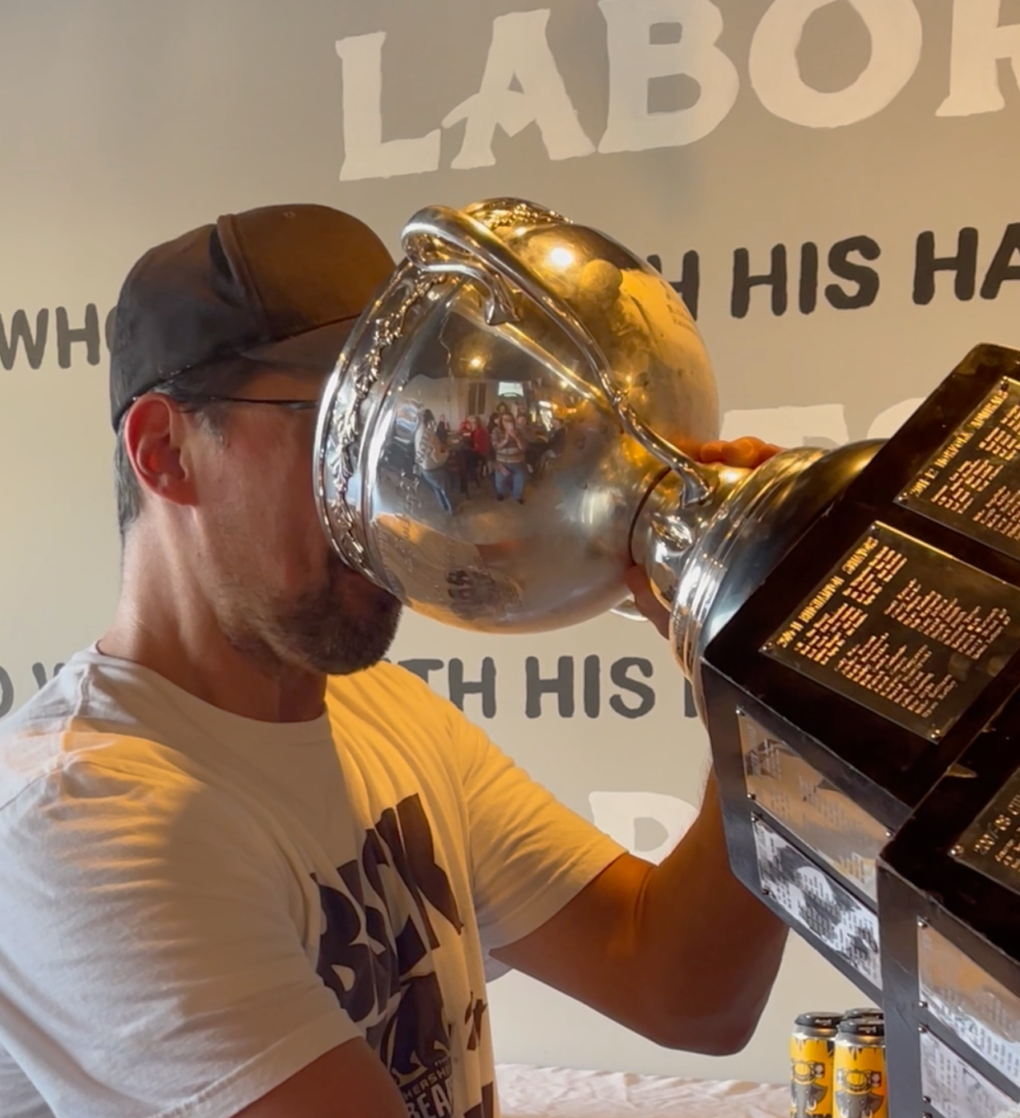 Brooks drinks out of the Calder Cup when it visited the taproom in October 2024.