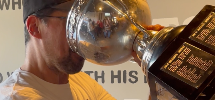 Brooks drinks out of the Calder Cup when it visited the taproom in October 2024.